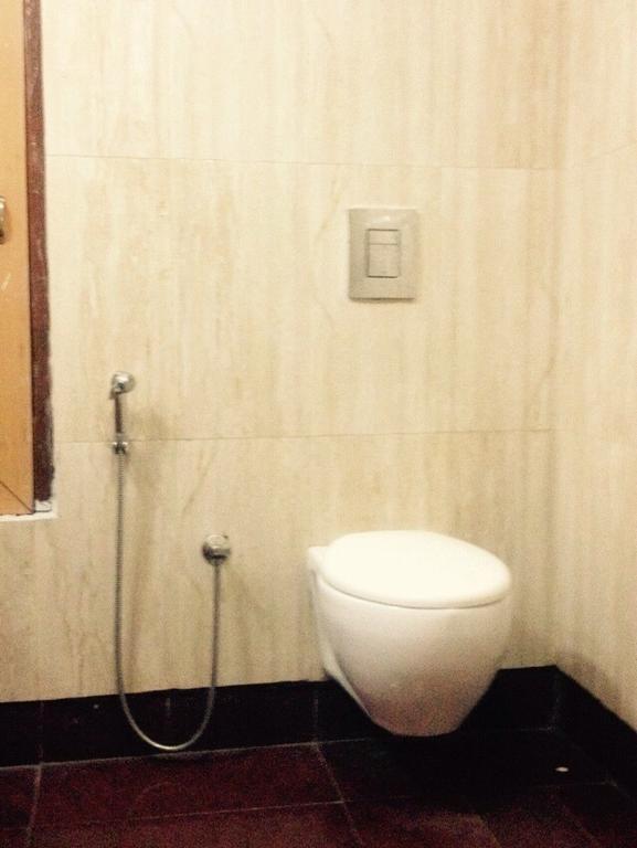 Hotel Bengal International Силигури Стая снимка